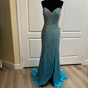 Tiffany Designs Turquoise Blue Sequin beaded Strapless Gown with train. Size 2